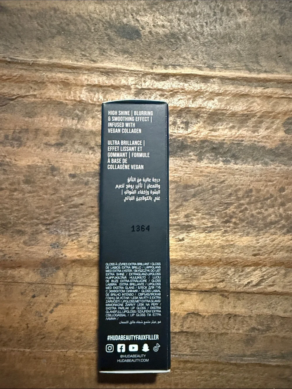 HUDA BEAUTY Faux Filler Extra Shine Lip Gloss - Black Packaging